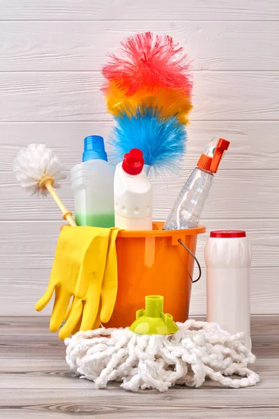 Variety of cleaning products in bucket.