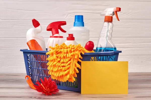 House cleaning products in basket.