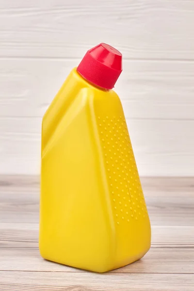 Gelbe Flasche mit Waschpulver. — Stockfoto