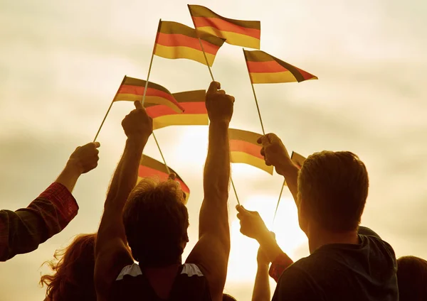 People hold german flags. — Stock Photo, Image