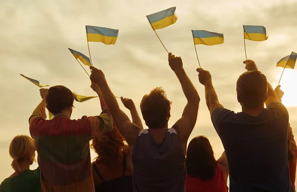 Ukrainian patriots with small flags. — Stock Photo, Image