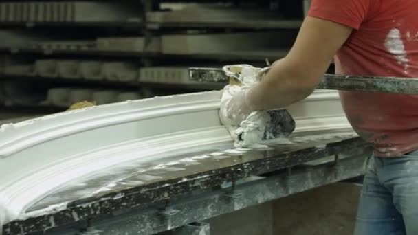 Worker shaping gypsum product. — Stock Video