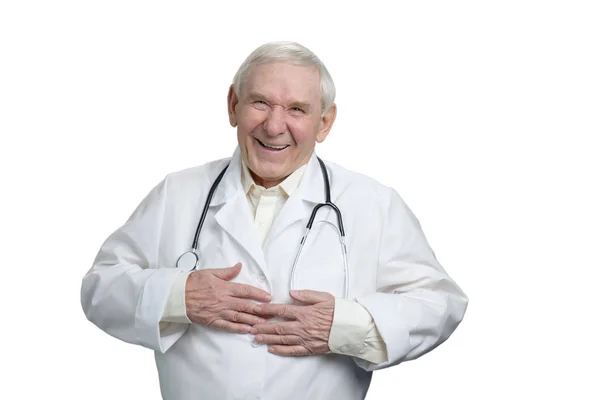 Old doctor laughing heartily touching stomach. — Stock Photo, Image