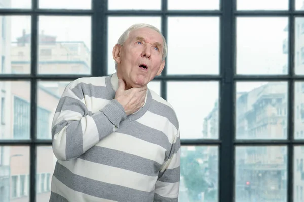 Old man is coughing. — Stock Photo, Image