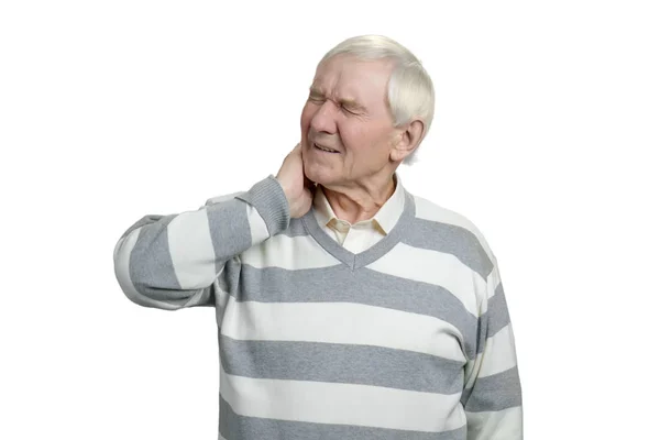 Kaukasische senior met nekpijn. — Stockfoto