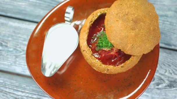 Borsch with parsley top view. — Stock Video