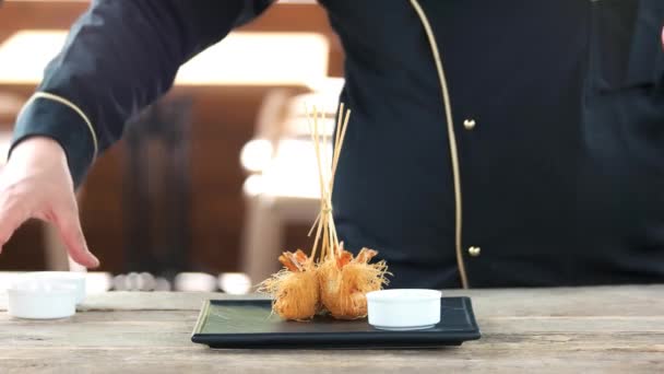 Chef preparing kataifi shrimps. — Stock Video