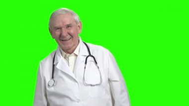 Yaşlı doktor gülüyorsun, ağır çekim.