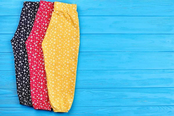 Colorful baby pants, copy space. — Stock Photo, Image