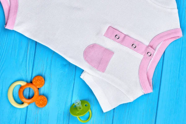 Close up of infant baby cotton clothes. — Stock Photo, Image