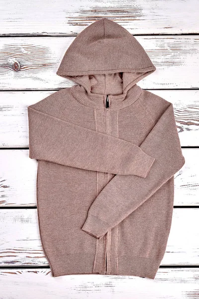 New hooded brown knitted sweater. — Stock Photo, Image