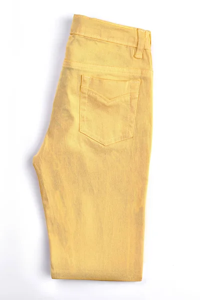 Kobieta wbije żółte spodnie. — Zdjęcie stockowe