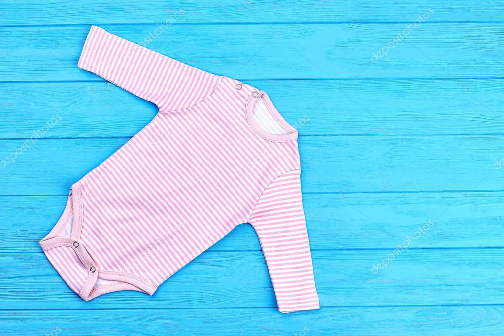White pink striped baby bodysuit.