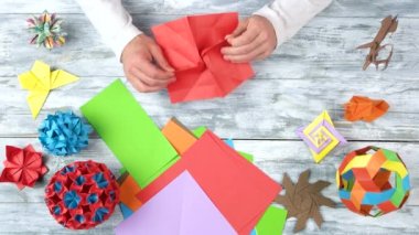 Origami çiçek, üstten görünüm yapmak kişi.