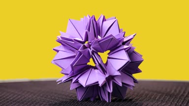 Güzel origami çiçek Sarı zemin üzerine.