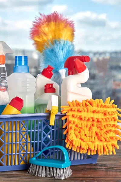 Cleaning products and supplies in basket.
