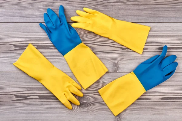 Yellow and blue rubber gloves.