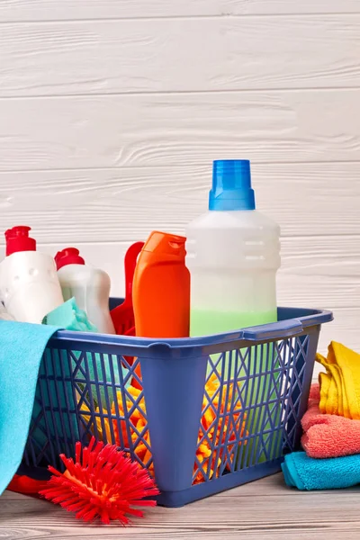 Variety of cleaning products in basket.
