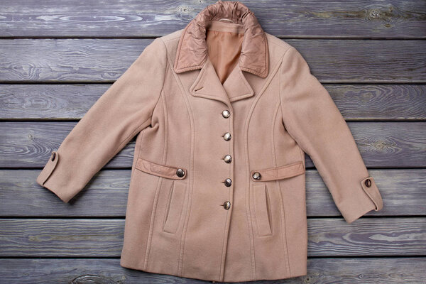 Female autumn topcoat, top view.