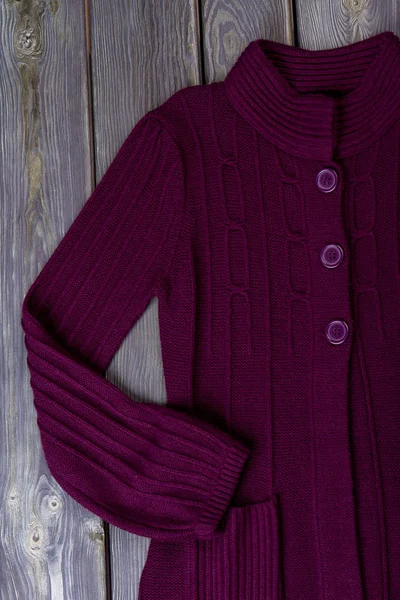 Female trendy knitted cardigan.