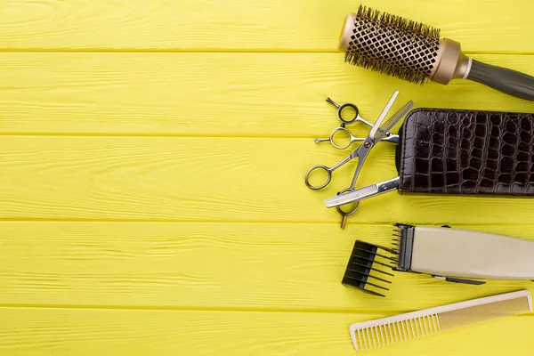 Professional hairdresser scissors on wooden background. Stock Photo by  ©Denisfilm 321452460