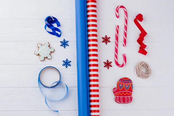 Gift wrapping supplies on wooden background. — Stock Photo, Image