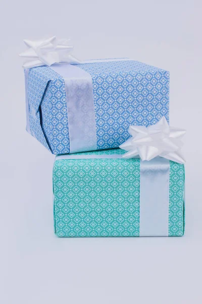 Two gift boxes wrapped in beautiful paper. — Stock Photo, Image