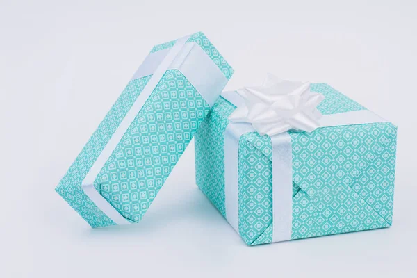 Wrapped present boxes on light background. — Stock Photo, Image