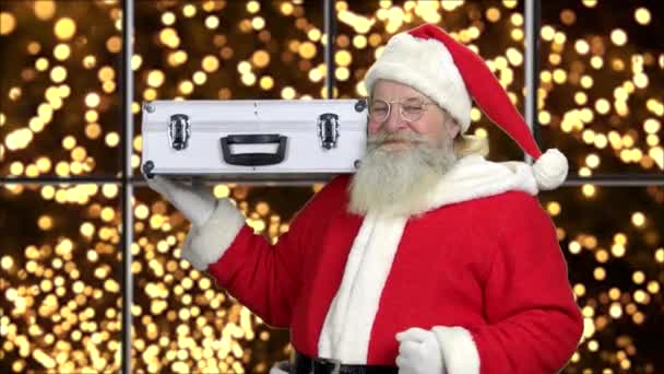 Old Santa is opening metal case with money. — 图库视频影像