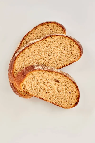 Kromki chleba pszennego, widok z góry. — Zdjęcie stockowe