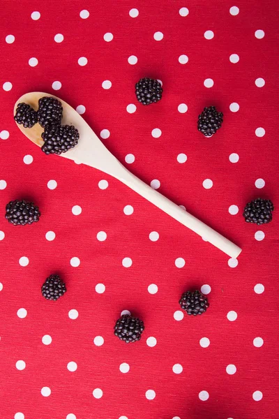 Berries circle and wooden spoon. — Stock Photo, Image