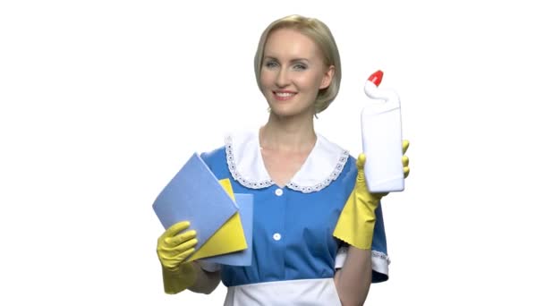 Woman maid with toilet cleaner bottle and rags. — Stock Video