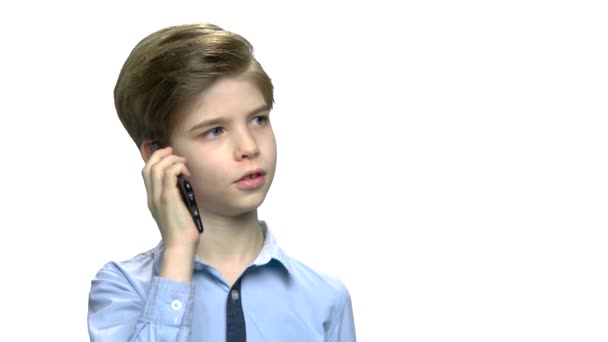 Smart little boy talking on cell phone. — 비디오