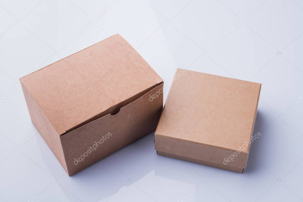 Two different cardboard boxes isolated on white.