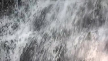 Close up flowing waterfall water.