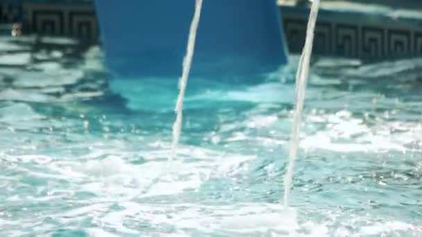 Close up two pool water streams. — Stock Video