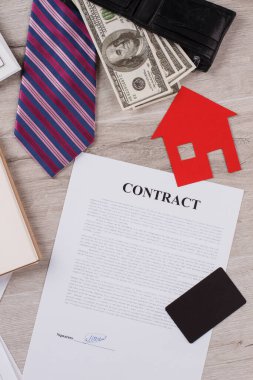 Signed contract with various items.