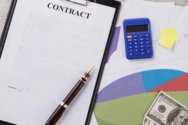 Contract, calculator and sticker. — Stock Photo, Image