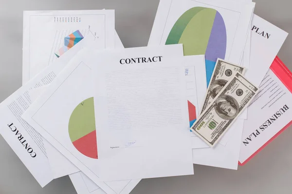 Layout with documents and dollar banknotes. — Stock Photo, Image