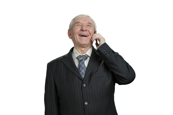 Old businessman laughing talking on phone. — Stock Photo, Image