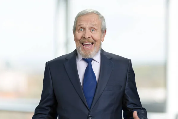 Extremely happy old businessman rejoicing. — Stockfoto
