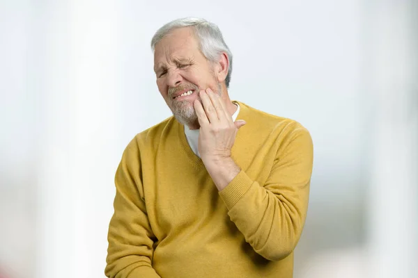 Portrait of old man suffering from toothache. — Stock Photo, Image