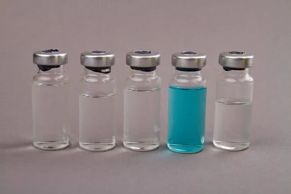 Five medical vial ampoules with various medicine. — Stock Photo, Image