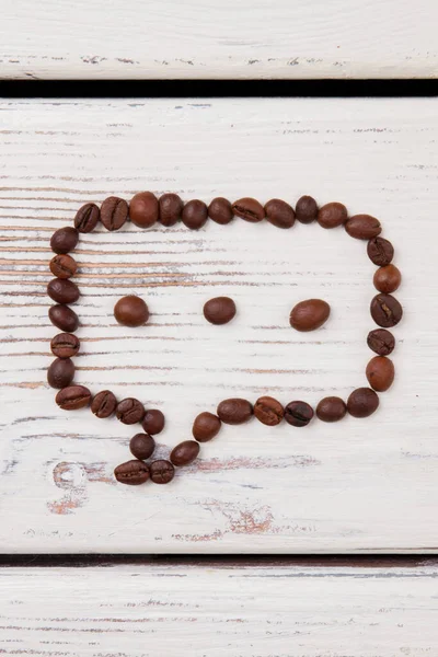 コーヒー豆の泡を三粒で語る. — ストック写真