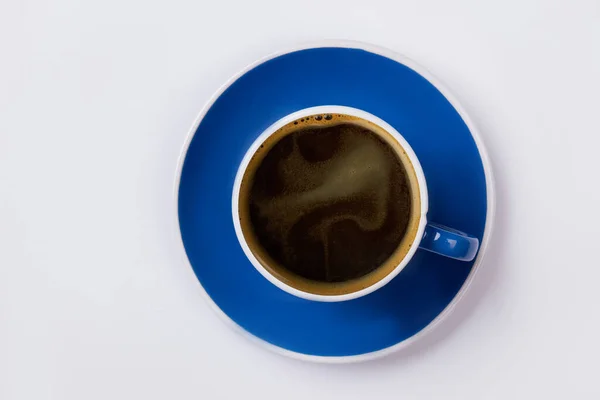 Top widok niebieski filiżanka kawy. — Zdjęcie stockowe