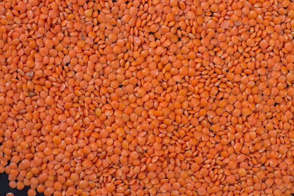 Latar belakang lentil oranye penuh tampilan atas. — Stok Foto