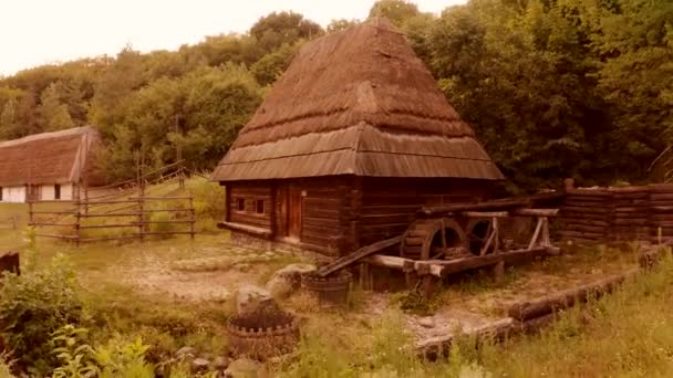 Old wooden shack house in a village. — Stock Video