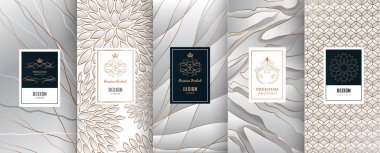 Collection of design elements,labels,icon,frames, for packaging,design of luxury products.Made with golden foil.Isolated on silver and marble background. vector illustration clipart