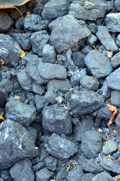 Lignite coal mineral black cube stone background