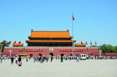 Chinese national flag waving in the main entrance in Forbidden city (Beijing, China) clipart